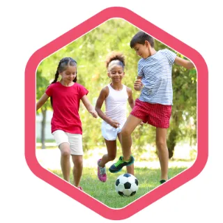 children of various ages play ball games at an ambrose school age care vacation care program